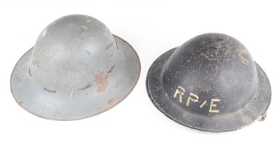 Lot 3292 - A WW II Zuckerman helmet, the leather liner...