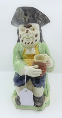Lot 2 - A Staffordshire Toby jug, ordinary type,...