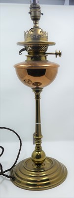 Lot 9 - A late 19th century brass and copper oil lamp,...