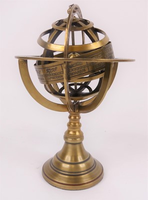 Lot 35 - A reproduction brass model of an astro globe,...