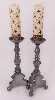 Lot 38 - A pair of pewter table candlesticks, each...