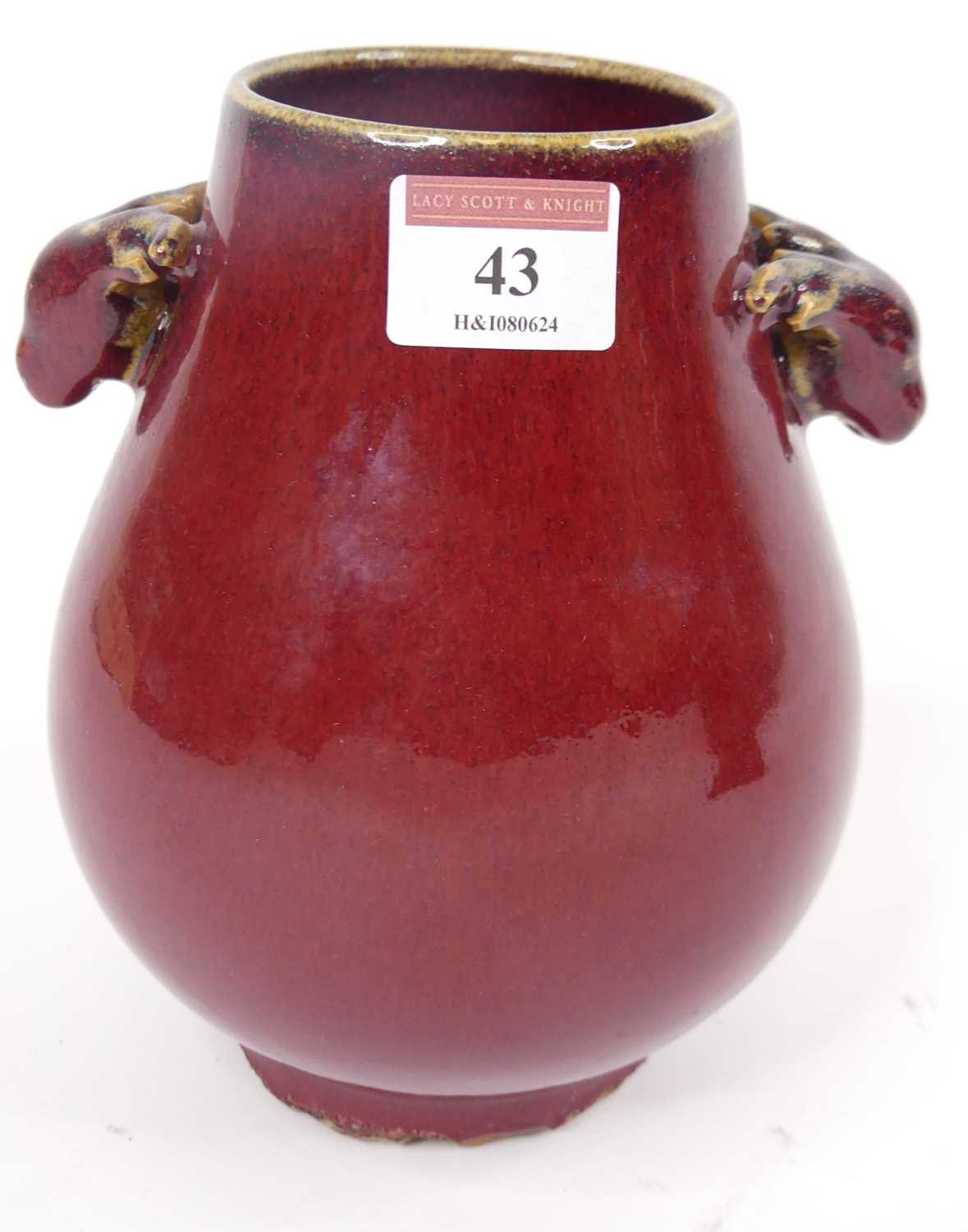 Lot 43 - A Chinese Sang de Boeuf vase, of Hu form,...
