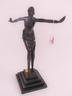 Lot 42 - An Art Deco style bronzed metal figure of a...