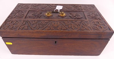 Lot 100 - An eastern carved teak box, having a brass...