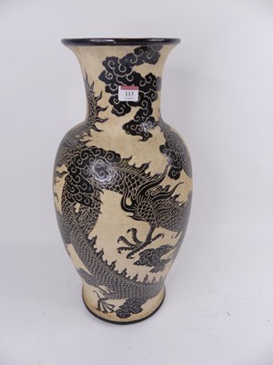 Lot 113 - A Chinese pottery vase, enamel decorated with...