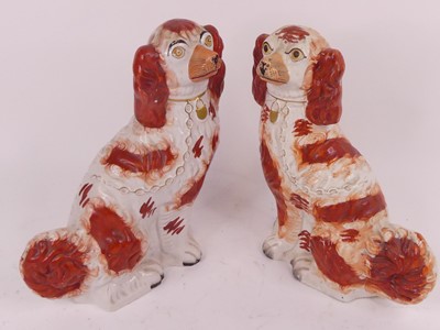 Lot 127 - A pair of Victorian Staffordshire models of...