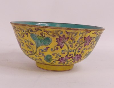 Lot 159 - A Chinese yellow glazed footed bowl, enamel...