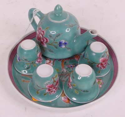 Lot 163 - A Chinese porcelain miniature tea set...