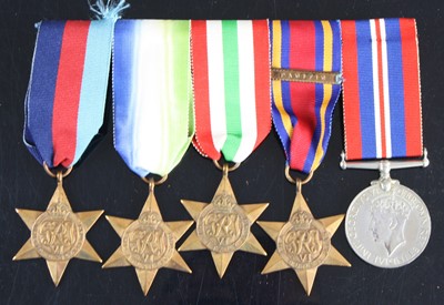 Lot 3251 - A group of five WW II medals to include...