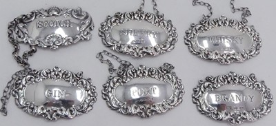 Lot 231 - A matched set of Elizabeth II silver decanter...