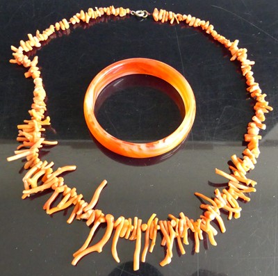 Lot 265 - A natural coral necklace; together with an...