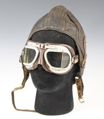 Lot 3383 - A German brown leather flying type helmet,...