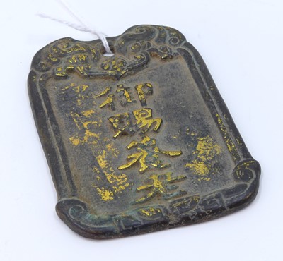 Lot 396 - A Chinese parcel-gilt bronzed metal pendant,...