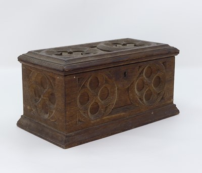 Lot 408 - A 19th century carved oak twin compartment tea...