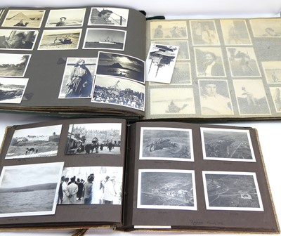 Lot 422 - An early 20th century photograph album,...