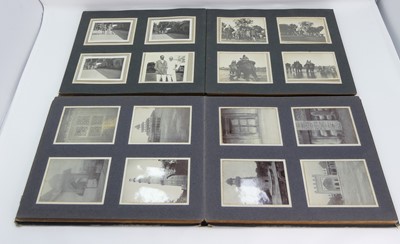 Lot 438 - An early 20th century photograph album and...