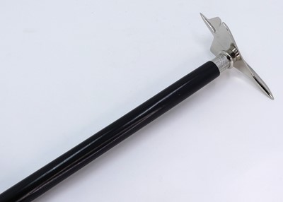 Lot 450 - A modern ebonised walking stick, the handle in...