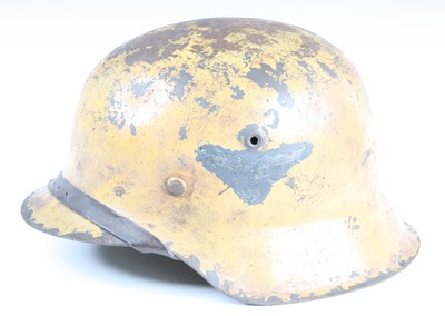 Lot 3358 - A German Luftwaffe M42 steel helmet, painted...