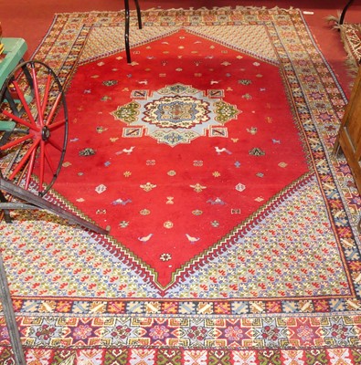 Lot 1118 - A Morrocan woollen red ground Rbati rug, with...