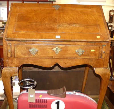 Lot 1171 - An early 20th century figured walnut and...