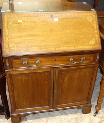 Lot 1175 - An Edwardian mahogany and satinwood inlaid...