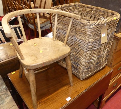 Lot 1184 - A twin handled round cornered wicker laundry...