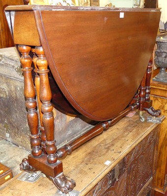 Lot 1202 - A mid-Victorian mahogany Sutherland table,...