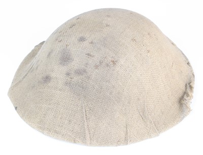 Lot 3360 - A British First World War steel helmet...