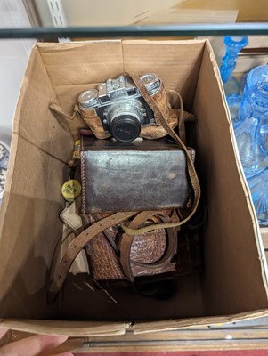 Lot 479 - A vintage Paxette SLR camera, together with...