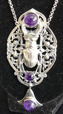 Lot 280 - A reproduction white metal cabochon amethyst...