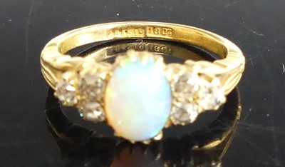 Lot 304 - An 18ct gold, opal and diamond dress ring, the...