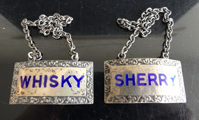 Lot 324 - A pair of modern silver decanter collars,...