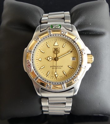 Lot 327 - A lady's Tag Heuer Professional midsize steel...