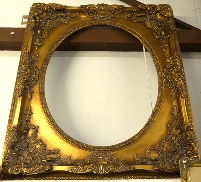 Lot 1010 - A reproduction gilt composition picture frame,...