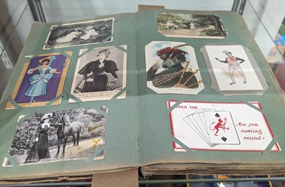 Lot 451 - An album containing a collection of vintage...