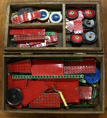 Lot 1411 - A wooden box containing Meccano metal components