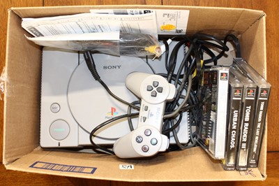 Lot 1414 - A Play Station 1 video game console, to...