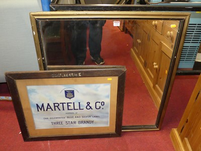 Lot 1049 - A framed advertising sign for Martell & Co...