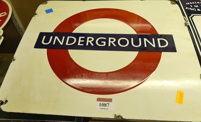 Lot 1087 - An enamel advertising sign for London...