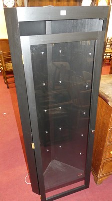 Lot 1305 - Black painted modern corner cabinet, with...