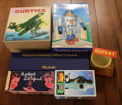 Lot 1508 - A small quantity of boxed tin plate models to...