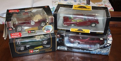 Lot 1515 - Four boxed 1/18 scale modern issue diecast...