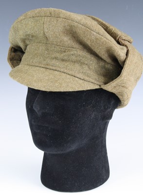 Lot 3078 - A Victorian Rifles cap, in green lambswool...