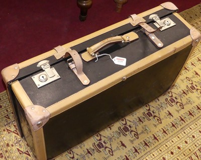 Lot 1229 - A canvas and tan leather trim fitted suitcase...