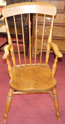 Lot 1262 - An early 20th century elm seat and stained...