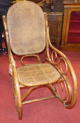 Lot 1267 - A stained bamboo and cane back and seat...