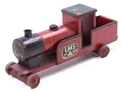 Lot 2025 - A Triang LMS wooden pull-along carpet train,...