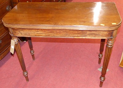 Lot 1303 - A Regency mahogany D-shaped foldover tea table,...