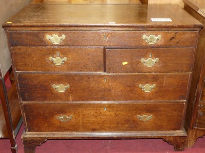 Lot 1304 - An early 19th century provincial oak chest...