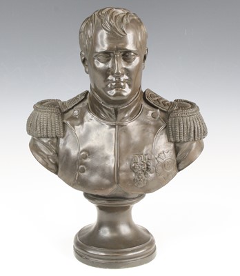 Lot 97 - A bronzed resin head and shoulders bust of...